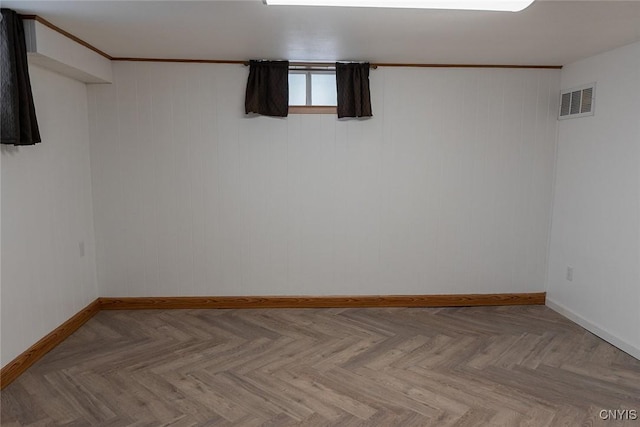 unfurnished room featuring light parquet floors