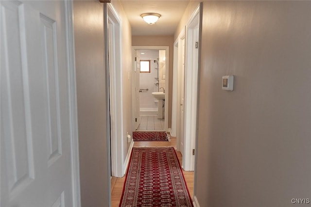 hallway featuring light hardwood / wood-style flooring