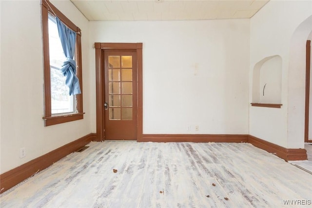 spare room with light hardwood / wood-style floors