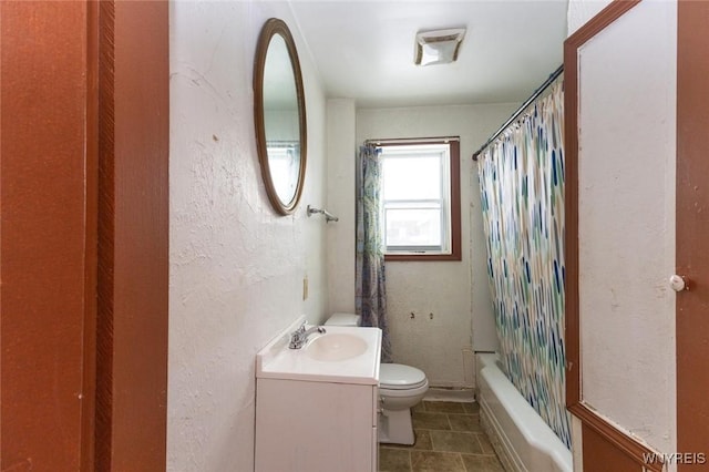 full bathroom with vanity, tile patterned floors, shower / bath combination with curtain, and toilet