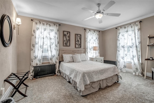 bedroom featuring radiator, crown molding, light colored carpet, and ceiling fan