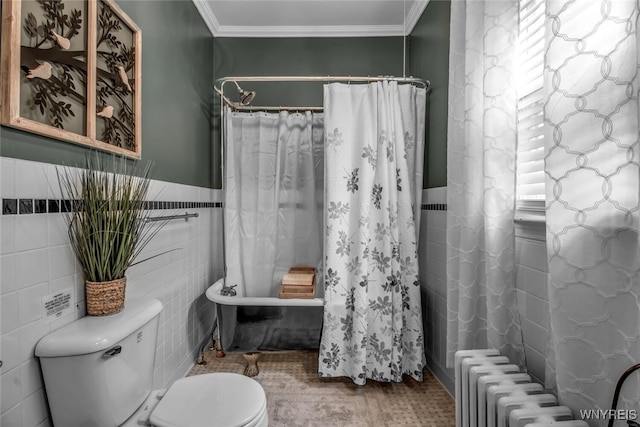 bathroom featuring tile walls, crown molding, radiator heating unit, and toilet