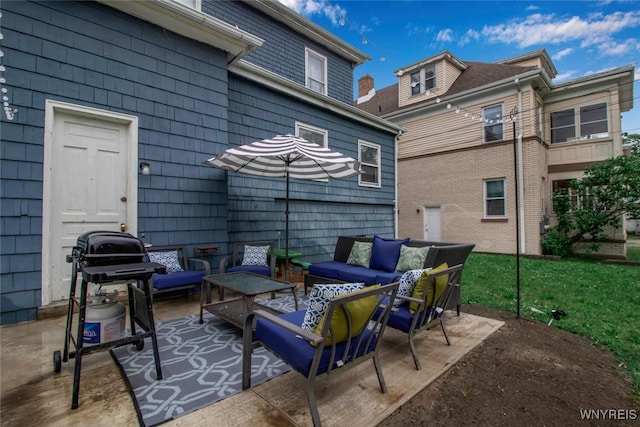 view of patio / terrace with grilling area and an outdoor hangout area