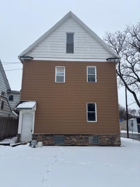 view of snow covered property