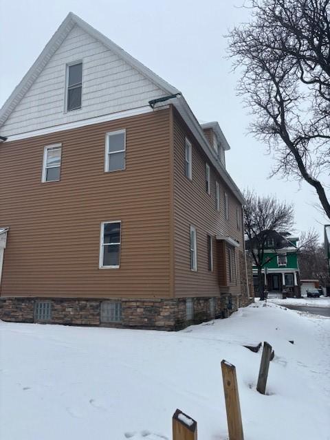 view of snow covered property