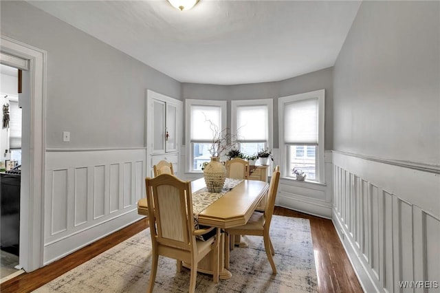 dining area featuring dark hardwood / wood-style floors