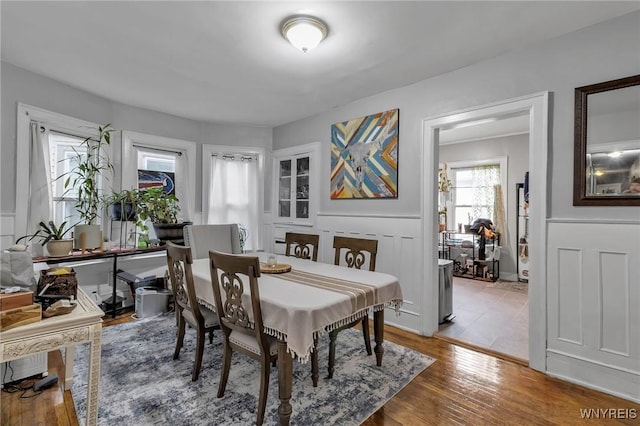 dining space featuring hardwood / wood-style flooring