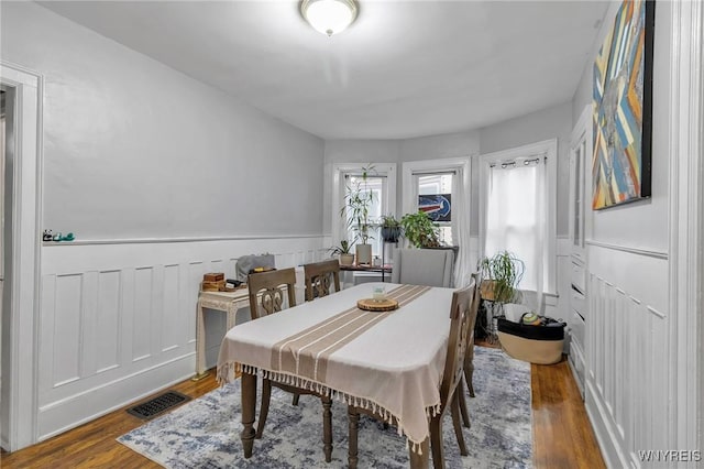 dining room featuring dark hardwood / wood-style flooring