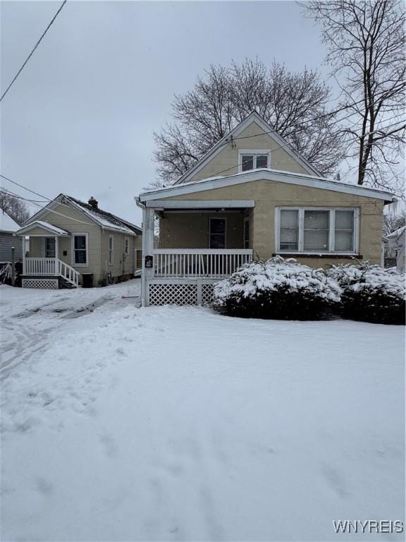 bungalow-style house with covered porch