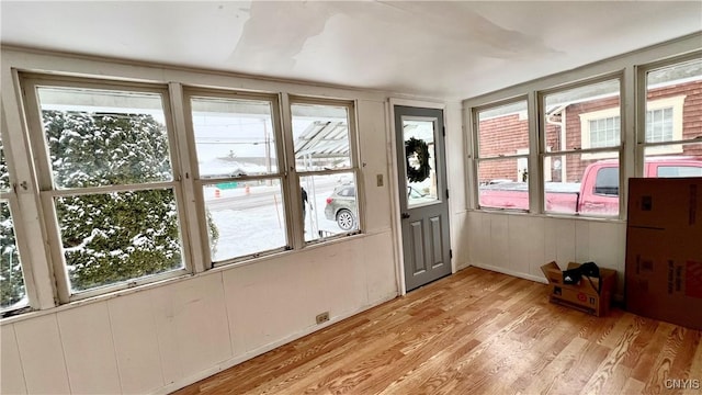 doorway with light hardwood / wood-style flooring