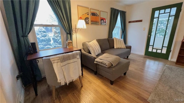 sitting room with light hardwood / wood-style floors