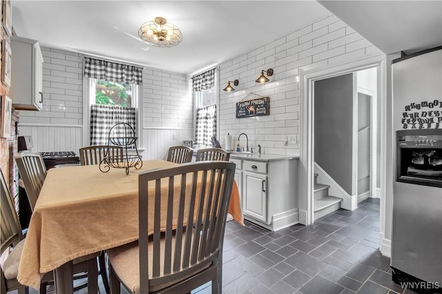 dining space with sink