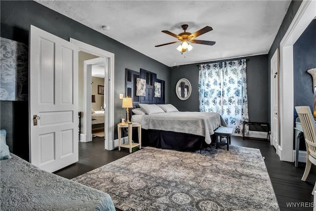 bedroom featuring dark wood-type flooring and ceiling fan