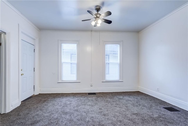 carpeted empty room with crown molding and ceiling fan