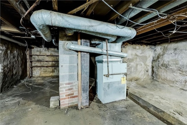 basement featuring heating unit