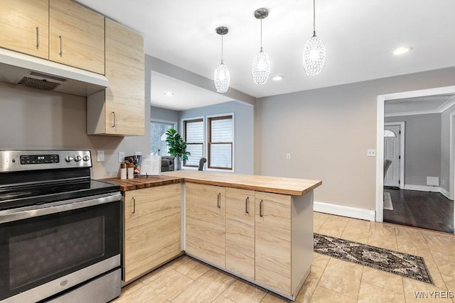 kitchen with stainless steel range with electric stovetop, wooden counters, light brown cabinetry, and hanging light fixtures