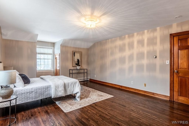 bedroom featuring dark hardwood / wood-style floors