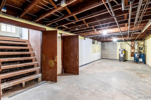 basement featuring electric water heater