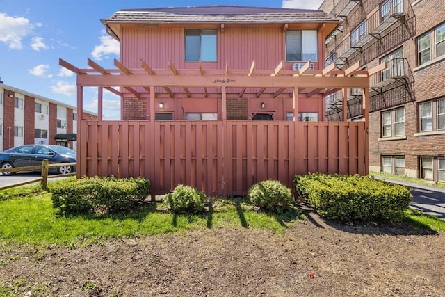 exterior space featuring a pergola