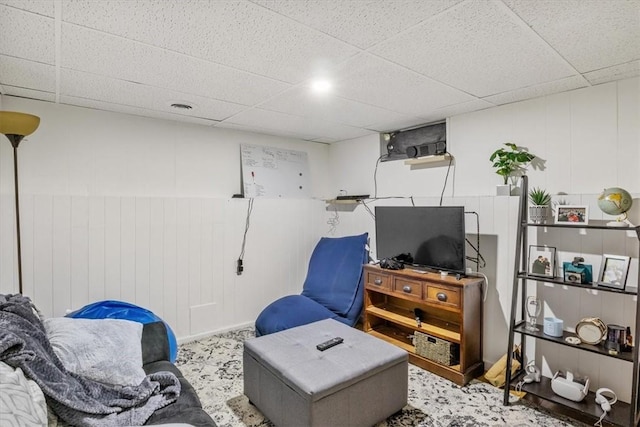 sitting room with a paneled ceiling