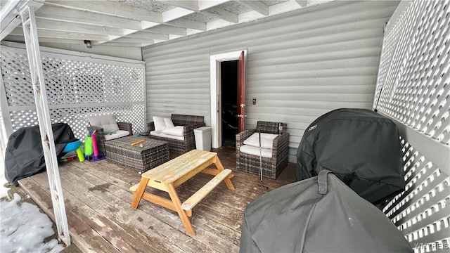 deck with an outdoor hangout area