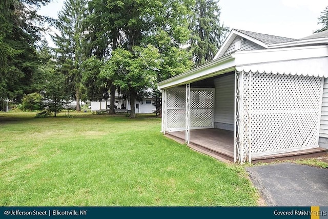 exterior space featuring an attached carport