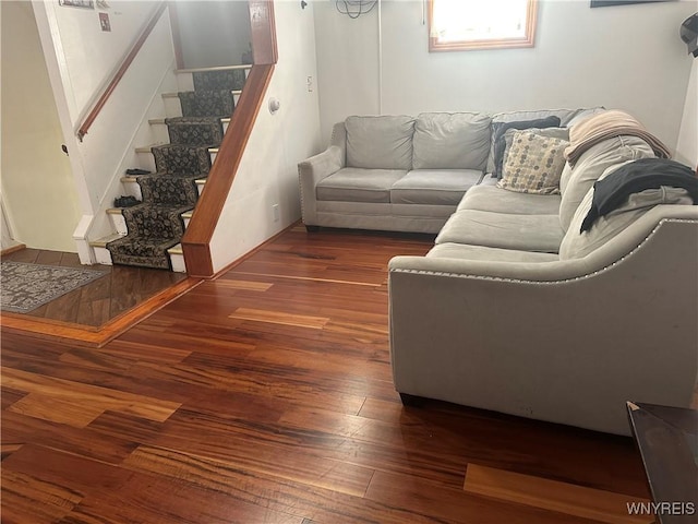 living room with dark hardwood / wood-style floors