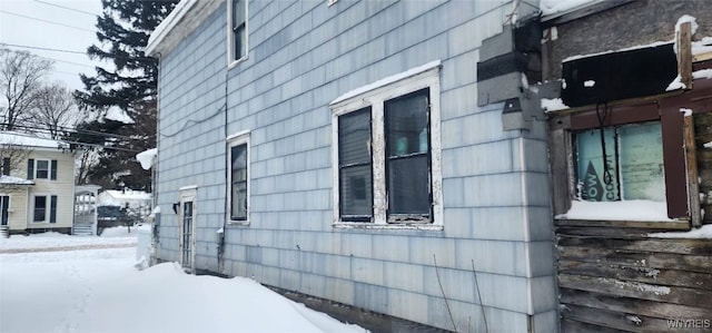 view of snow covered property