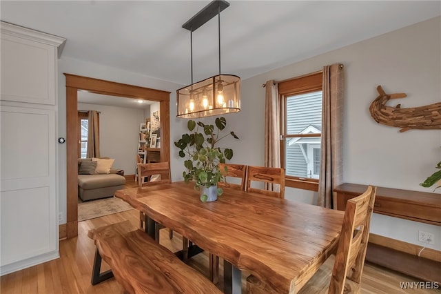 dining area with light wood-type flooring