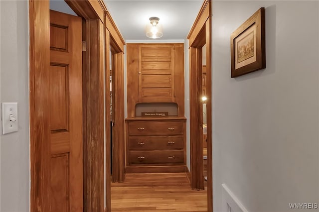 hall with light hardwood / wood-style floors