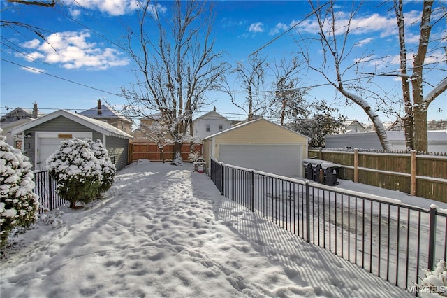 exterior space with a garage and an outdoor structure