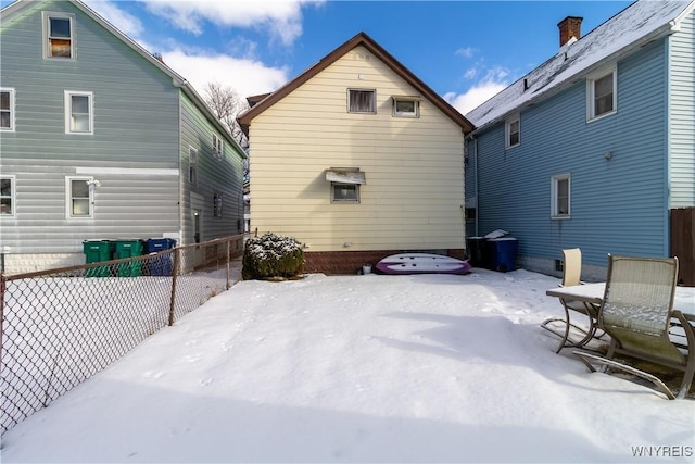 view of snow covered property