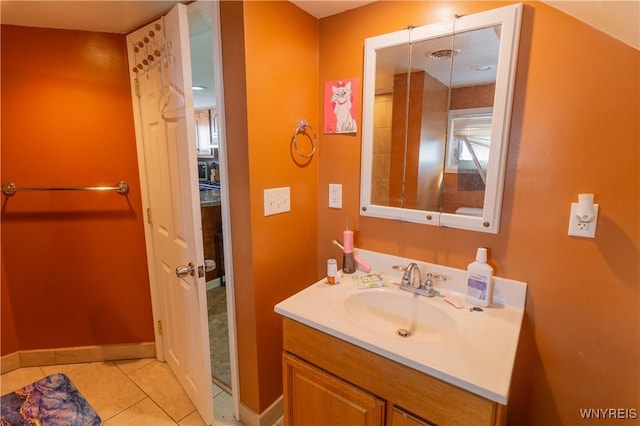 bathroom with vanity and tile patterned floors