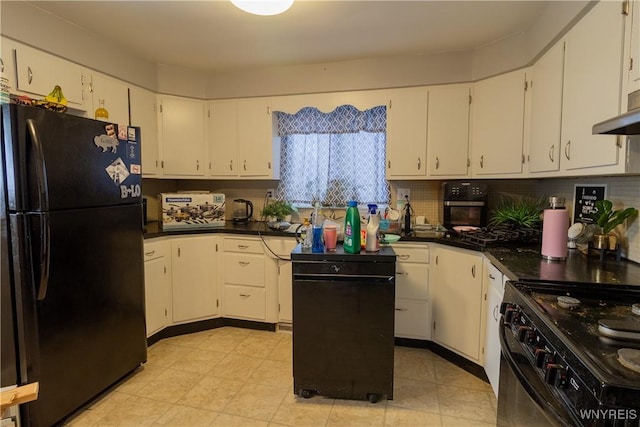 kitchen with backsplash, white cabinets, and black appliances