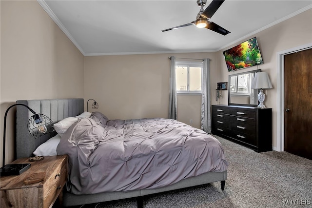 carpeted bedroom featuring ornamental molding and ceiling fan