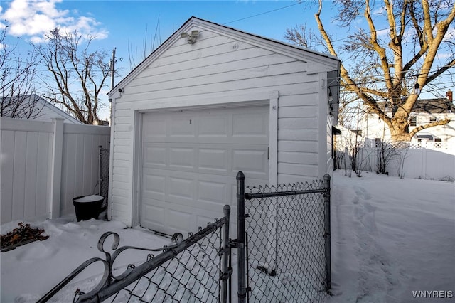 view of snow covered garage