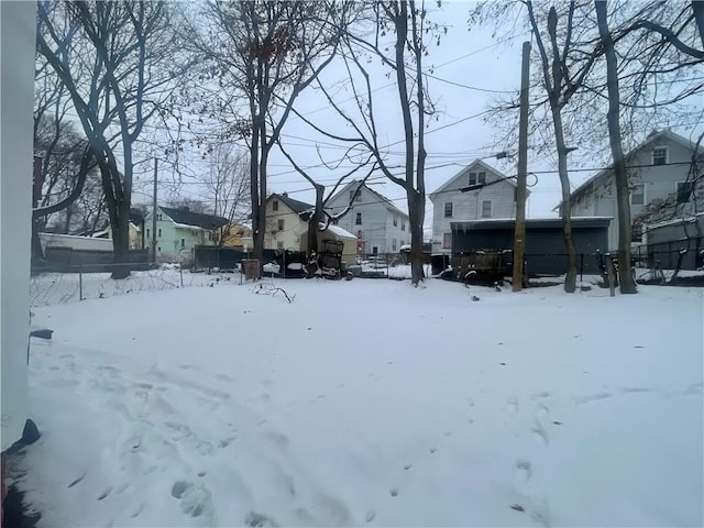 view of yard layered in snow