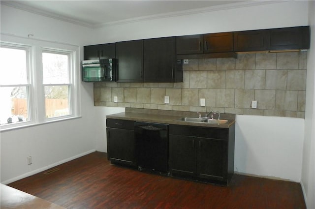 kitchen featuring sink, crown molding, dark wood-type flooring, backsplash, and black appliances