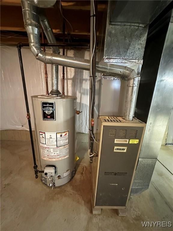 utilities featuring heating unit and gas water heater