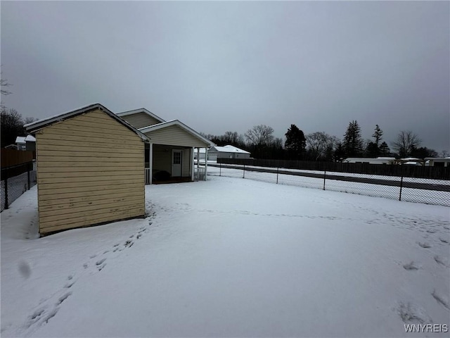 view of yard covered in snow