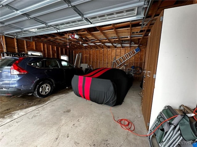 garage with a garage door opener