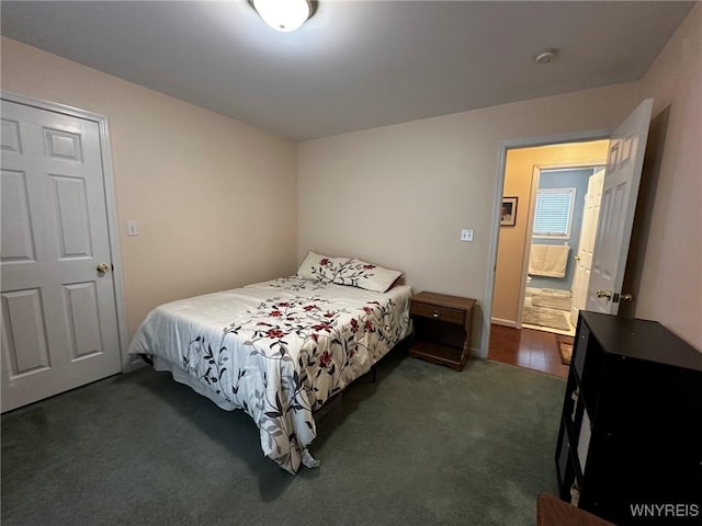 bedroom with dark carpet