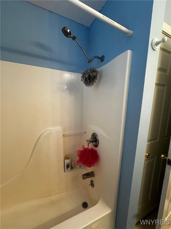 bathroom featuring  shower combination