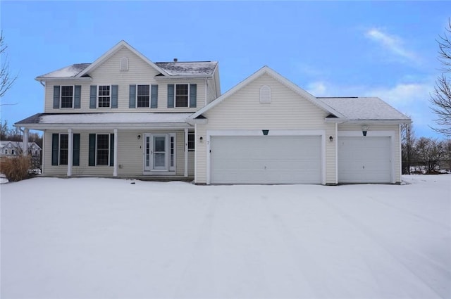 view of front of property featuring a garage