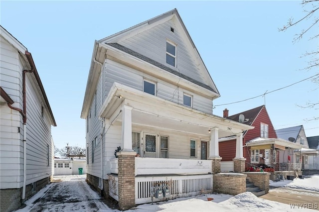 view of front of property featuring covered porch