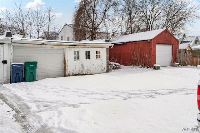 view of snow covered garage