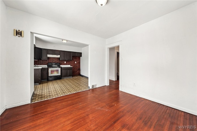 living room with dark hardwood / wood-style flooring