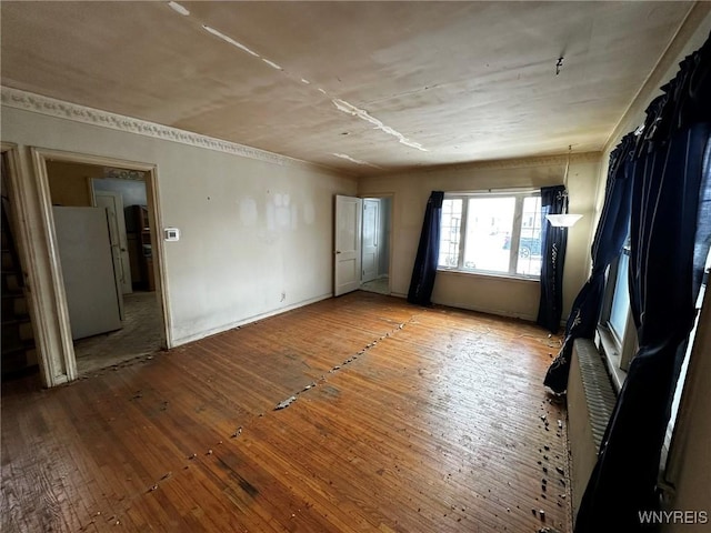 spare room featuring light wood-type flooring