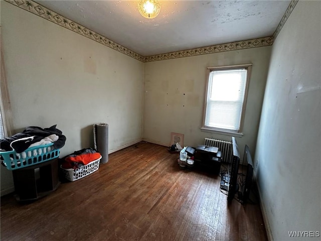 empty room featuring hardwood / wood-style floors