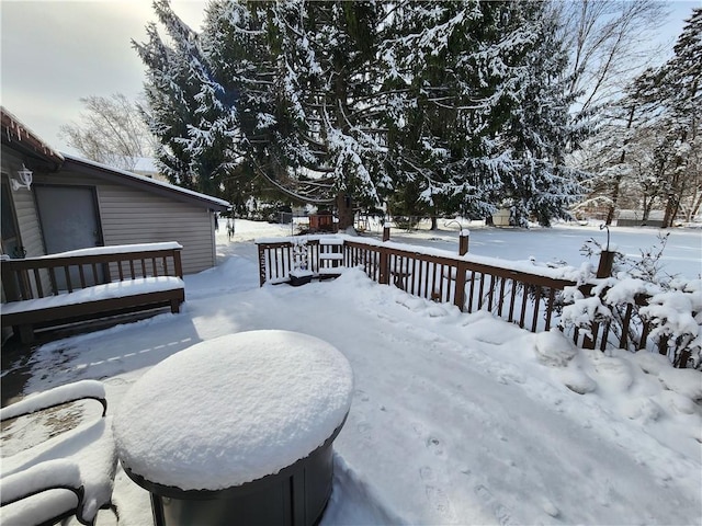 view of snow covered deck